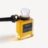Fragrance miniature bottle charm in black Fragrance miniature bottle charm in black
