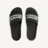 Men’s pool slide sandal in black/white Men’s pool slide sandal in black/white