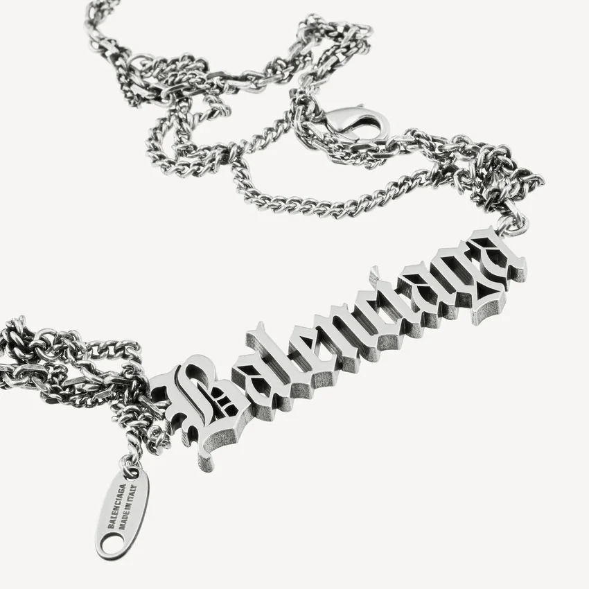 Typo destroyed necklace in antique silver Typo destroyed necklace in antique silver