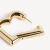 Women’s b earrings in shiny gold
