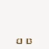 Women’s b xs earrings in shiny gold