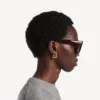 Women’s b xs earrings in shiny gold