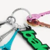 Women’s biker balenciaga charm/keychain in green/black