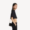 Women’s hourglass phone pouch in black