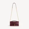 Women’s hourglass pochette with chain in dark burgundy Women’s hourglass pochette with chain in dark burgundy