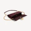 Women’s hourglass pochette with chain in dark burgundy Women’s hourglass pochette with chain in dark burgundy
