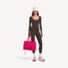 Women’s techwear fitted long sleeve top in khaki brown/neon pink