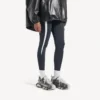 Women’s track stencil logo sneaker in black/white