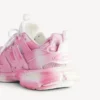 Women’s track stencil logo sneaker in pink/white